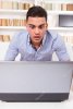 depositphotos_44230165-stock-photo-concerned-man-looking-at-computer.jpg